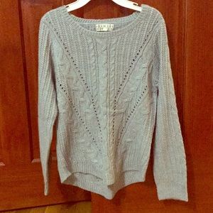 Shimmery gray sweater.